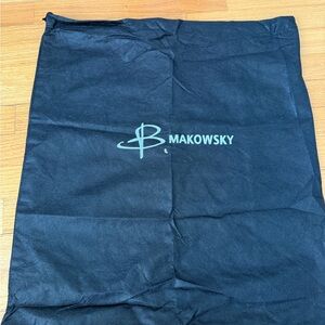 B. Makowsky Black Storage Bag